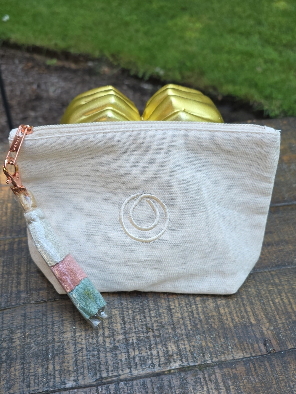Monat Embroidered Natural Canvas Cosmetic Pouch with Tassel Bag Charm